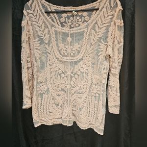 Sheer peach top with lace detail